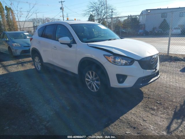  Salvage Mazda Cx