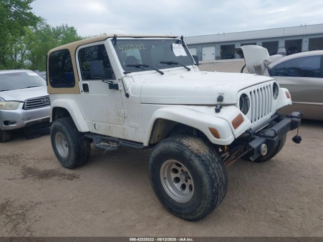  Salvage Jeep Wrangler