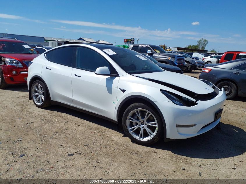 7SAYGDEE9PA139839 2023 Tesla Model Y at TX Wilmer, IAAI lot 37608060