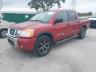 1N6BA0ED4FN****** Used and Repairable 2015 Nissan Titan in Clearwater