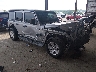 1C4HJXDG2JW****** Salvamento y Destrozados 2018 Jeep Wrangler en Kansas City East