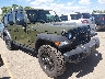 1C4HJXDG8MW****** Salvamento y Destrozados 2021 Jeep Wrangler en Denver East