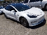 5YJ3E1EA3PF****** Salvamento y Destrozados 2023 Tesla Model 3 en Electric Vehicle Auctions