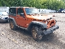 1J4AA2D11BL****** Salvamento y Destrozados 2011 Jeep Wrangler en Grand Rapids