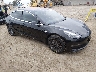 5YJ3E1EA3JF****** Salvamento y Destrozados 2018 Tesla Model 3 en Electric Vehicle Auctions