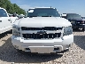 1GNSKJE74ER****** Wrecked 2014 Chevrolet Suburban in Kansas State