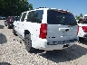1GNSKJE74ER****** Salvage and Repairable 2014 Chevrolet Suburban in Kansas City