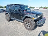 1C4HJXFG6JW****** Salvamento y Destrozados 2018 Jeep Wrangler en Clearwater