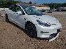 5YJ3E1EA7PF****** Salvamento y Destrozados 2023 Tesla Model 3 en Electric Vehicle Auctions