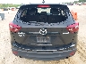 JM3KE4DY7G0****** Wrecked 2016 Mazda CX-5 in Florida State