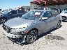 2HGFC1F38JH****** Salvage and Wrecked 2018 Honda Civic in Austin North